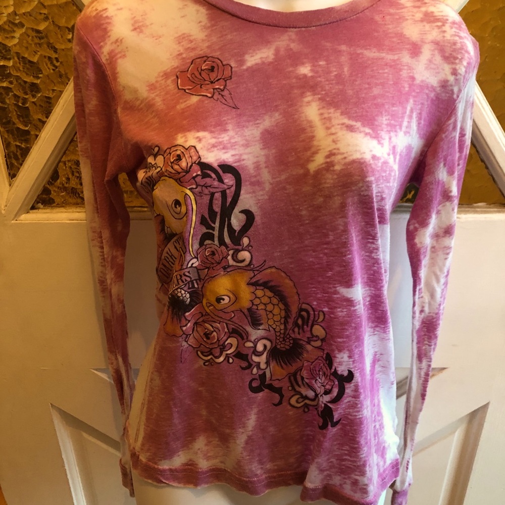 Lightweight pink in color long sleeve tee